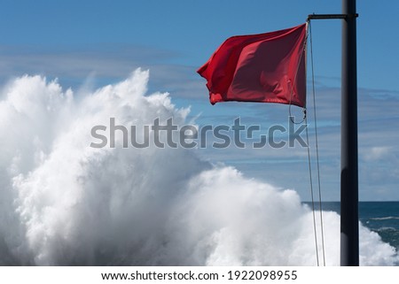 Red flag danger big waves, with no swimming notes
