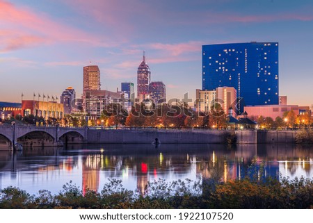 Indianapolis, Indiana, USA skyline on the White River at dusk.