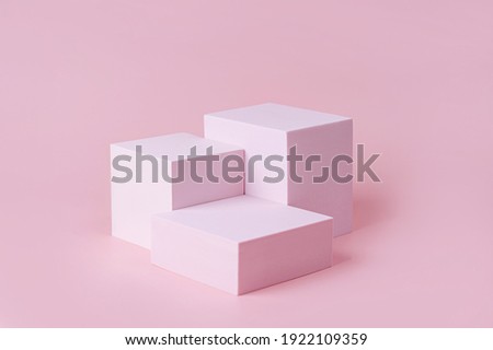Geometric shapes podium for product display. Monochrome platform on pink background. Stylish background for presentation. Minimal style. Royalty-Free Stock Photo #1922109359