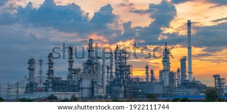 Oil and Gas Industrial zone,The equipment of oil refining,Close-up of industrial pipelines of an oil-refinery plant,Detail of oil pipeline with valves in large oil refinery. Royalty-Free Stock Photo #1922111744