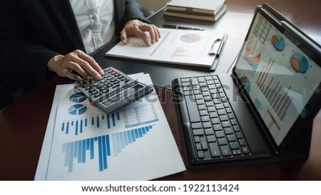 Administrator business man financial inspector and secretary making report calculating balance. Internal Revenue Service checking document. Audit concept Royalty-Free Stock Photo #1922113424