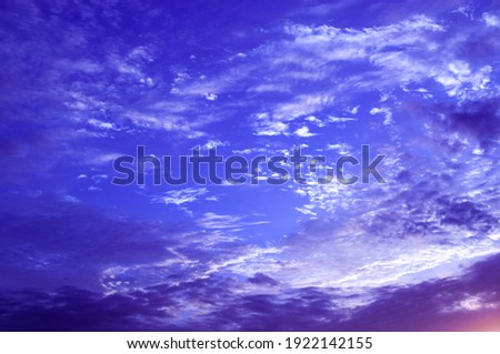 Sky with clouds, blue and violet. Horizon. Feelings of sadness.
