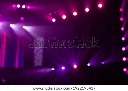 Background editing image source with spectacular stage lighting and light effects Royalty-Free Stock Photo #1922195417