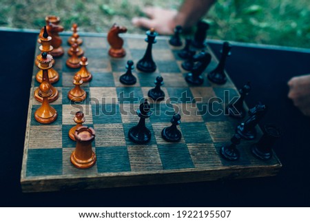 play chess, board and pieces