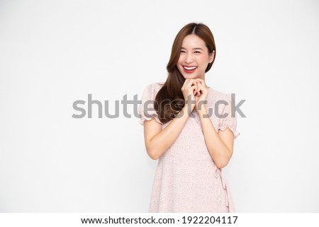 Portrait of Young beautiful Asian businesswoman standing and smiling isolated on white background, Looking at camera Royalty-Free Stock Photo #1922204117
