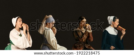 Fast food. Medieval women as a royalty persons from famous artworks in vintage clothing on dark background. Concept of comparison of eras, modernity and renaissance, baroque style. Creative collage. Royalty-Free Stock Photo #1922218475