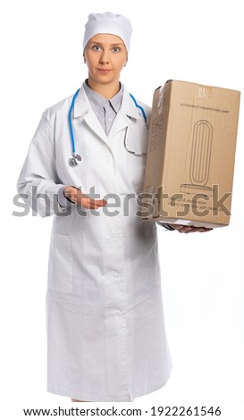 female doctor in a white coat and hat. the doctor keeps an ultraviolet lamp in a box and hands it to us. disinfection as a gift. white background, isolated
