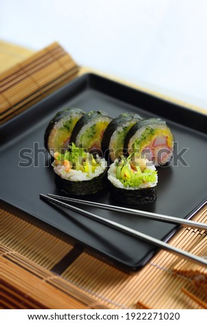 raw sushi - a traditional Japanese dish served in an appetizing form 