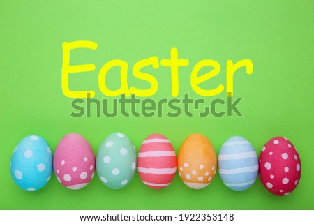 Colorful easter eggs on a green background