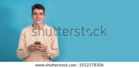 teenager boy or student with mobile phone isolated on background