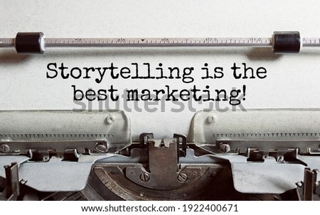 The text Storytelling is the best marketing is typed on paper by an antique typewriter. Vintage inscription, retro style, grunge, concept.