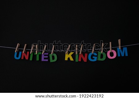 Word United Kingdom on black background. The United Kingdom of Great Britain and Northern Ireland, commonly known as the United Kingdom(UK or U.K.), or Britain, is a sovereign country in north-western