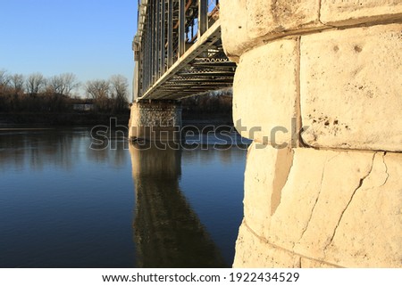 Bridge reflection in Missouri River at Berkley Riverfront in Kansas City, Missouri Royalty-Free Stock Photo #1922434529