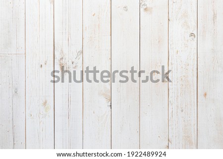 Pine wood plank texture painted with white color for use as wood pattern, background, backdrop, table top, wall plank, floor plank, etc. Royalty-Free Stock Photo #1922489924