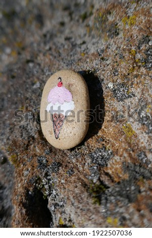 Kindness rock with ice cream cone painted on