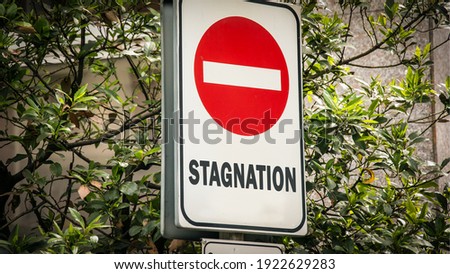 Street Sign the Direction Way to Innovation versus Stagnation Royalty-Free Stock Photo #1922629283