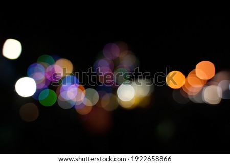 Beautiful blurry bokeh with balloon lights and motorcycle lights