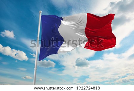 Large French flag waving in the wind Royalty-Free Stock Photo #1922724818