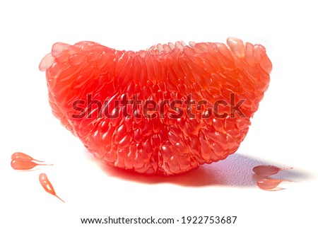 Fresh juicy piece of grapefruit pulp isolated on white background. Piece of peeled grapefruit close up. Slice of citrus fruit wallpaper Royalty-Free Stock Photo #1922753687