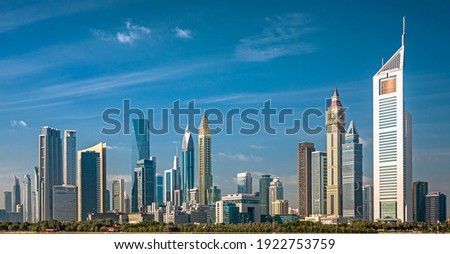 Dubai - amazing city center skyline with luxury skyscrapers and beautiful sky at sunrise, United Arab Emirates