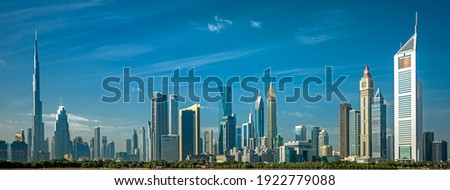Dubai - amazing city center skyline with luxury skyscrapers and beautiful sky at sunrise, United Arab Emirates