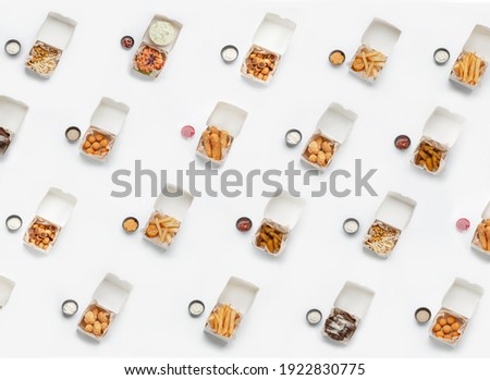 Fast food restaurant menu, meal review. Set in paper boxes, crispy, fresh snacks, french fries, nuggets, crackers, sauce in containers, isolated on white background, copy space, seamless pattern