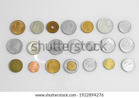 Many  vintage coins from different countries Euro Dollar Real Japan metal gold financial close economic cents pound finance business monetary collection 
