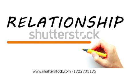 Hand writing RELATIONSHIP with marker. Isolated on white background. Business concept.
