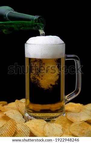 Potato chips and beer, snack beer, background