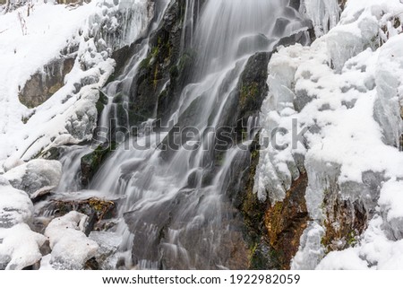 Frozen waterfall in the mountain in winters, France