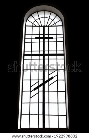 large church window silhouette, on black background, window with cross and arch