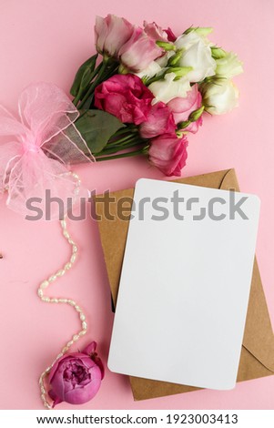 mock up greeting card. small bouquet of flowers and space for text 