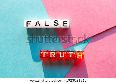 falsity and truth confrontation on the same surface, terms contradicting each other