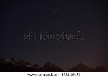 Starry night in the alpine mountains.