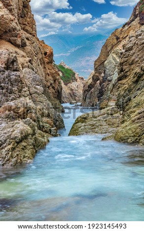 California nature - landscape, beautiful cove with rocks, on the seaside in Garrapata State Park. County Monterey, California, USA. Long exposure photo.