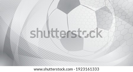 Football or soccer background with big ball in gray colors Royalty-Free Stock Photo #1923161333