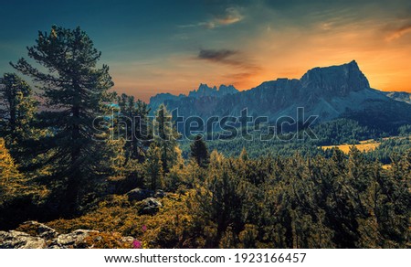 Amazing natural Landscape with colorful sky of Dolomites Alps during sunset. Passo Giau. Dolomite mountains. italy. Incredible nature scenery. Picture of wild area. Famous alpine place of the world