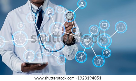 Doctors using stethoscope with digital medical interface icons, Technology healthcare And Medicine concept. 