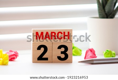 March 23rd, Day 23 of month, World Meteorological Day, Pakistan Day, Birthday, Anniversary, wooden block calendar on white wooden background with copy space for text. Royalty-Free Stock Photo #1923216953