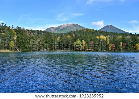 Scenery of the Onneto blue Lake and autumn leaves which are best time to see at Hokkaido