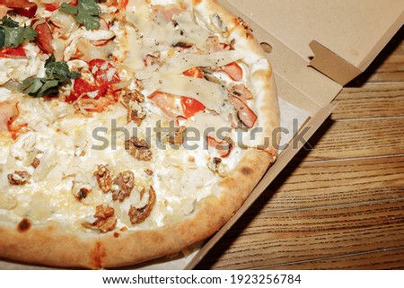 Pizza on wooden table top view. Fast food. Post blog social media. with copy space. Pizza ready to eat.