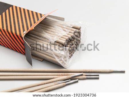 welding electrodes in packaging on a light background