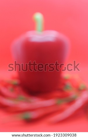 Blurred image of red bell pepper and red chili background. Suitable for poster, banner and card