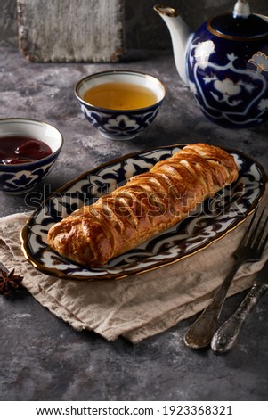 Traditional apple pie, strudel, served in a beautiful oriental plate