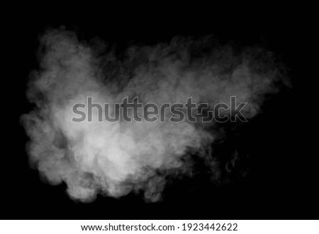 Isolated white smoke effect on black background. Royalty-Free Stock Photo #1923442622