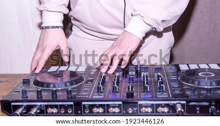  dj mixing music, hands of a dj with dj panel