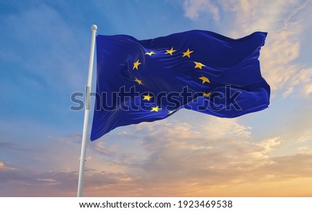 The Flag Of The European Union  waving in the wind. Royalty-Free Stock Photo #1923469538