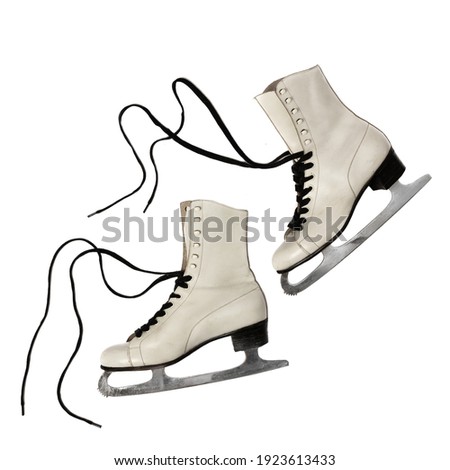 Old vintage white ice skates with black laces on white background