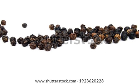  black peppercorns, isolated on white background 