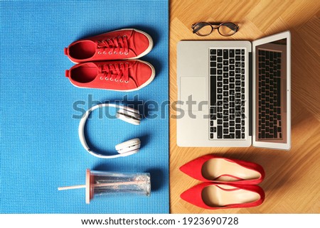 Flat lay composition with business items and sport accessories on color background. Concept of balance between work and life
